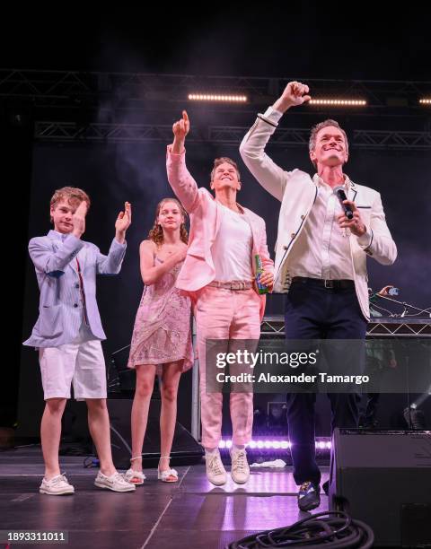 Gideon Burtka-Harris, Harper Burtka-Harris, David Burtka and Neil Patrick Harris are seen onstage during New Year's Eve Party Like A Royal at...