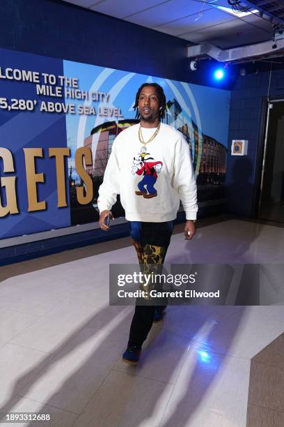 Kentavious Caldwell-Pope of the Denver Nuggets arrives to the arena before the game against the Charlotte Hornets on January 1, 2024 at the Ball...