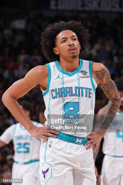 Nick Smith Jr. #8 of the Charlotte Hornets looks on during the game against the Denver Nuggets on January 1, 2024 at the Ball Arena in Denver,...