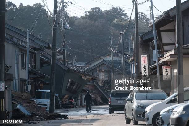 Collapsed houses following an earthquake in Nanao, Ishikawa Prefecture, Japan, on Tuesday, Jan. 2, 2024. At least 13 people were killed and scores...
