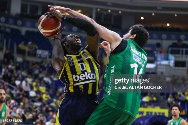 Istanbul, Turkey. Johnathan Motley, #0 of Fenerbahce Beko Istanbul in action against Ahmet Can Duran, #14 of Bursaspor Info Yatirim during the...