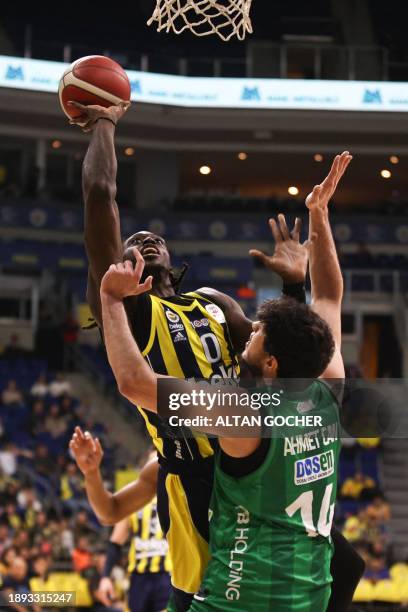 Istanbul, Turkey. Johnathan Motley, #0 of Fenerbahce Beko Istanbul in action against Ahmet Can Duran, #14 of Bursaspor Info Yatirim during the...