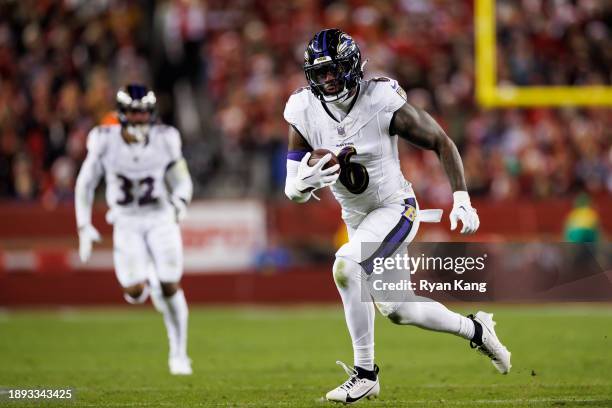 Patrick Queen of the Baltimore Ravens runs back an interception during an NFL football game against the San Francisco 49ers at Levi's Stadium on...