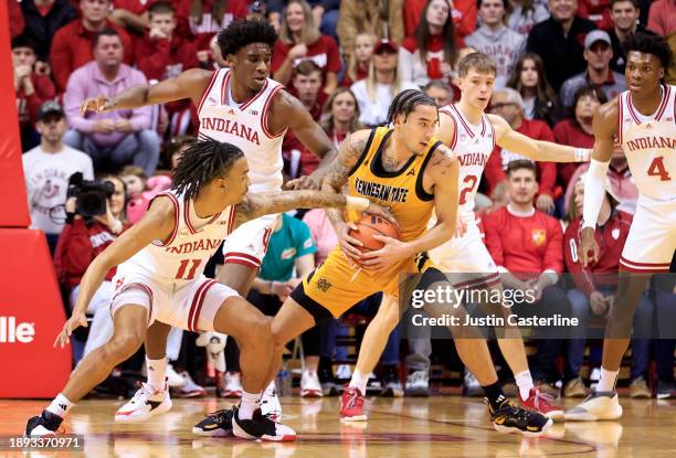 Gunn of the Indiana Hoosiers knocks the ball away from Jusaun Holt of the Kennesaw State Owls during the first half at Simon Skjodt Assembly Hall on...
