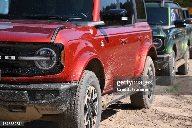 ford bronco vehicles on a parking - off road vehicle stock pictures, royalty-free photos & images