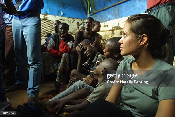 United Nations High Commissioner for Refugees Goodwill Ambassador Angelina Jolie on a truck with newly arrived refugees en route from Kigoma to...