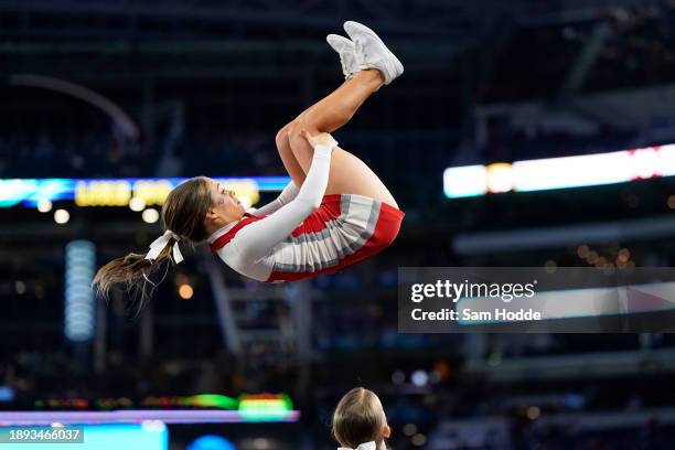 The Ohio State Buckeyes cheerleaders perform prior to a game against the Missouri Tigers during the Goodyear Cotton Bowl at AT&T Stadium on December...