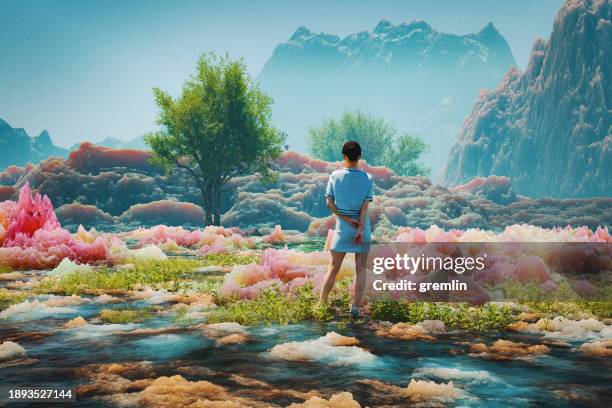 woman standing in fantasy landscape - sonhar acordado imagens e fotografias de stock