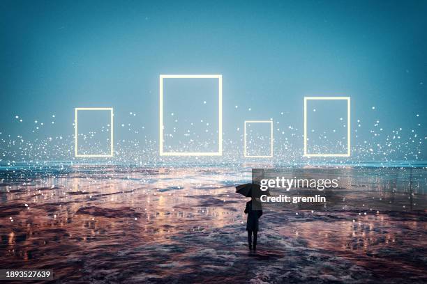 hombre con paraguas de pie frente a portales resplandecientes - cambiar de forma fotografías e imágenes de stock