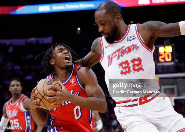 Jeff Green of the Houston Rockets guards Tyrese Maxey of the Philadelphia 76ers during the first half at Toyota Center on December 29, 2023 in...