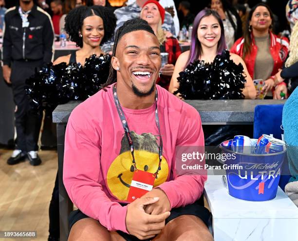 Player Bijan Robinson attends the game between the Sacramento Kings and the Atlanta Hawks at State Farm Arena on December 29, 2023 in Atlanta,...