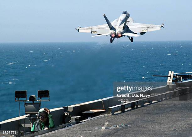 An F/A-18E Super Hornet launches from one of four steam powered catapults on the flight deck aboard USS Abraham Lincoln. Lincoln and Carrier Air Wing...