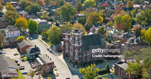 st. paul’s lutheran church in residential neighborhood of evansville, indiana - high angle drone shot - evansville stock-fotos und bilder
