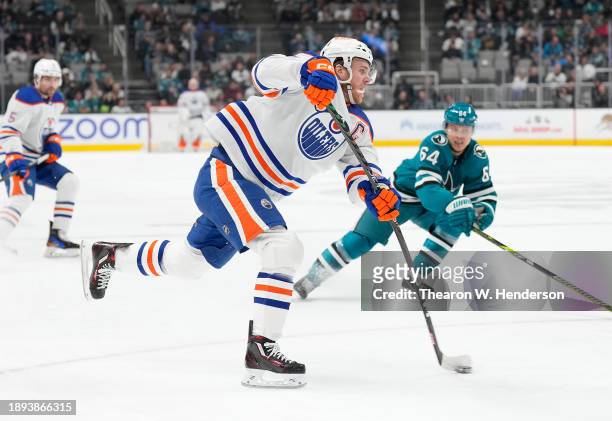 Connor McDavid of the Edmonton Oilers shoots on goal against the San Jose Sharks during the first period at SAP Center on December 28, 2023 in San...