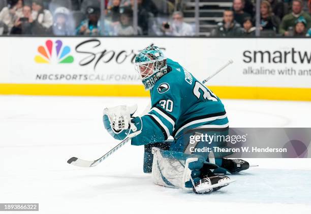 Goalie Magnus Chrona of the San Jose Sharks makes a glove hand save against the Edmonton Oilers during the first period at SAP Center on December 28,...