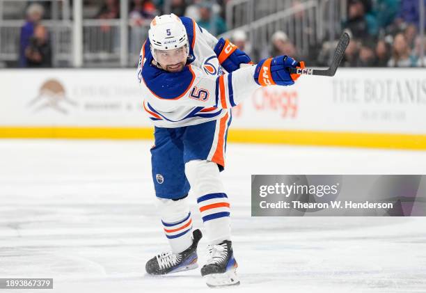 Cody Ceci of the Edmonton Oilers shoots on goal against the San Jose Sharks during the first period of an NHL hockey game at SAP Center on December...