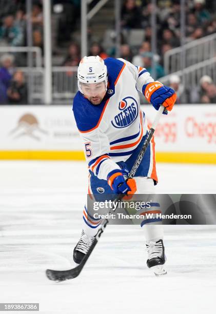 Cody Ceci of the Edmonton Oilers shoots on goal against the San Jose Sharks during the first period of an NHL hockey game at SAP Center on December...