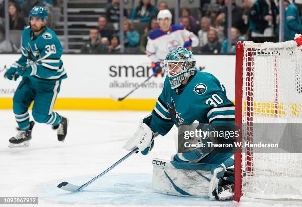 Goalie Magnus Chrona of the San Jose Sharks defends his goal against the Edmonton Oilers during the first period at SAP Center on December 28, 2023...