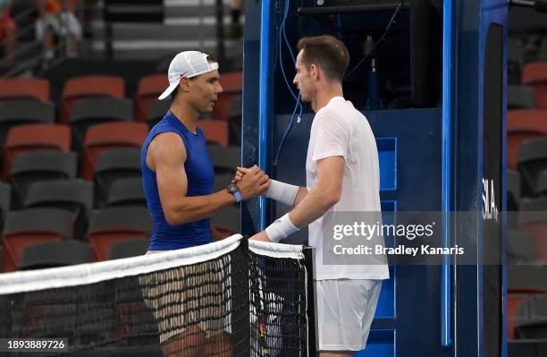 Rafael Nadal and Andy Murray shake hands after their practice match ahead of the 2024 Brisbane International at Queensland Tennis Centre on December...