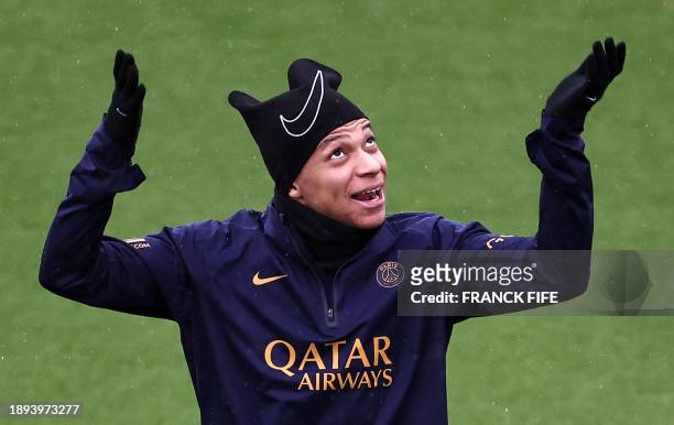 Paris Saint-Germain's French forward Kylian Mbappe gestures during a training session in Poissy, west of Paris, on January 2 on the eve of the French...