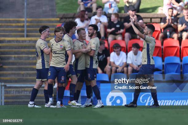 Trent Buhagiar of the Jets celebrates his goal with team mates during the A-League Men round 10 match between Newcastle Jets and Western United at...