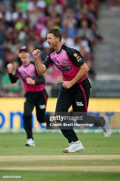 Jackson Bird of the Sixers celebrates after taking the wicket of Tom Kohler-Cadmore of the Thunder during the BBL match between Sydney Thunder and...