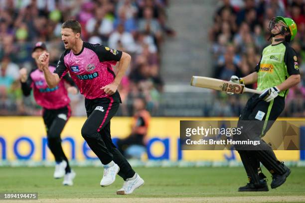 Jackson Bird of the Sixers celebrates after taking the wicket of Tom Kohler-Cadmore of the Thunder during the BBL match between Sydney Thunder and...