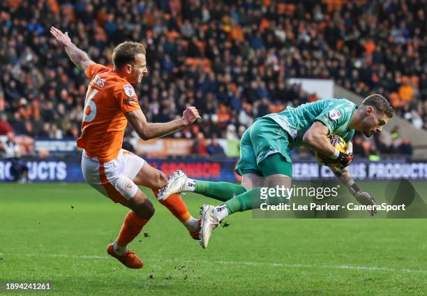Lincoln City's Lukas Jensen is fouled by Blackpool's Jordan Rhodes during the Sky Bet League One match between Blackpool and Lincoln City at...
