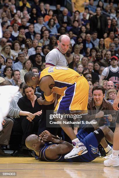 Kobe Bryant of the Los Angeles Lakers plays with Michael Jordan of the Washington Wizards during the NBA game at Staples Center on March 28, 2003 in...