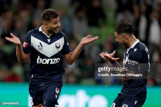 Zinedine Machach of Melbourne Victory celebrates a goal with Bruno Fornaroli of Melbourne Victory during the A-League Men round 10 match between...