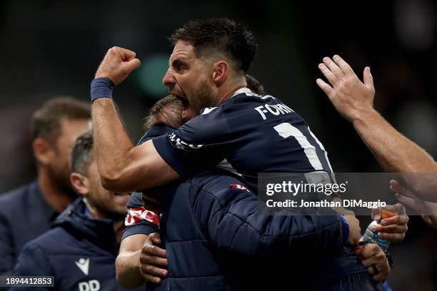 Bruno Fornaroli of Melbourne Victory celebrates a goal with teammates during the A-League Men round 10 match between Melbourne Victory and Adelaide...