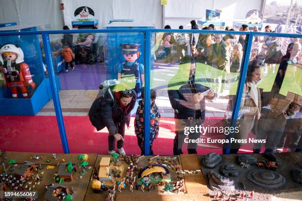 Several people visit the giant Playmobil Nativity Scene, in the Plaza de las Constelaciones, on 30 December, 2023 in Mostoles, Madrid, Spain....