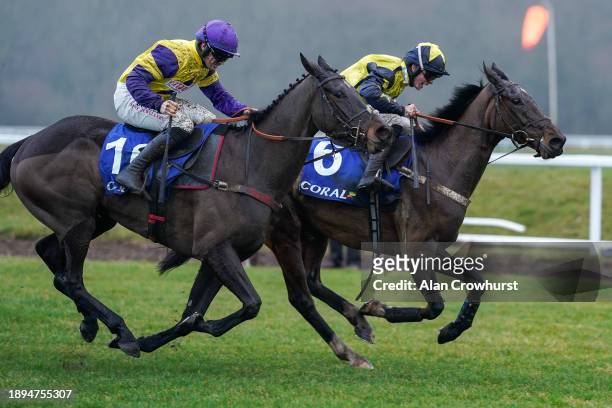 James Bowen riding Surrey Quest clear the last to win The Coral Mandarin Handicap Chase at Newbury Racecourse on December 30, 2023 in Newbury,...