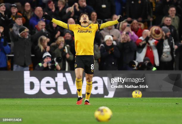 Joao Gomes of Wolverhampton Wanderers celebrates after Matheus Cunha of Wolverhampton Wanderers scores their sides second goal during the Premier...