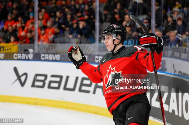 Canada's Matthew Wood celebrates scoring the 1-2 goal during the quarter-final match between Canada and Czech Republic of the IIHF World Junior...