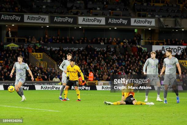 Craig Dawson of Wolverhampton Wanderers scores their sides third goal during the Premier League match between Wolverhampton Wanderers and Everton FC...