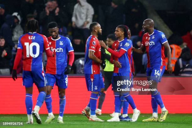 Michael Olise of Crystal Palace celebrates with teammates after scoring their team's third goal during the Premier League match between Crystal...