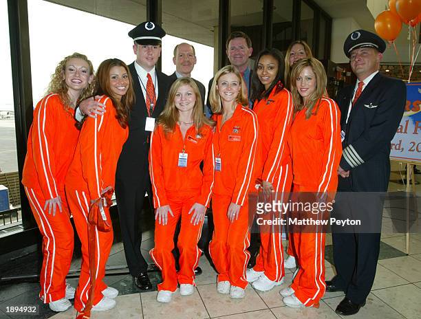 Hooters executives, Hooters airline pilots and Hooters Girls celebrate the inauguration of the airline's new service between Newark and Myrtle Beach,...