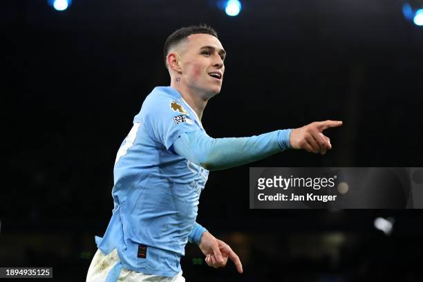 Phil Foden of Manchester City celebrates after Julian Alvarez of Manchester City scores their sides second goal during the Premier League match...