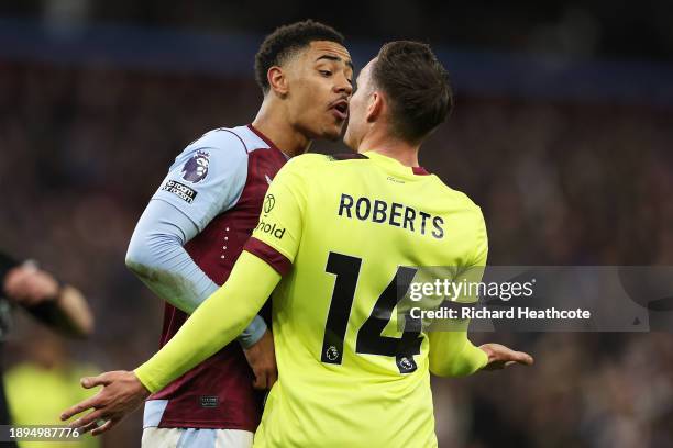 Jacob Ramsey of Aston Villa clashes with Connor Roberts of Burnley during the Premier League match between Aston Villa and Burnley FC at Villa Park...