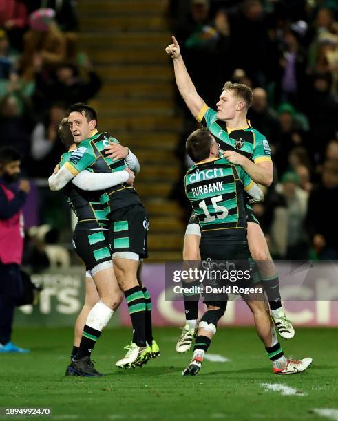 Fin Smith and George Furbank of Northampton Saints celebrate victory during the Gallagher Premiership Rugby match between Northampton Saints and Sale...