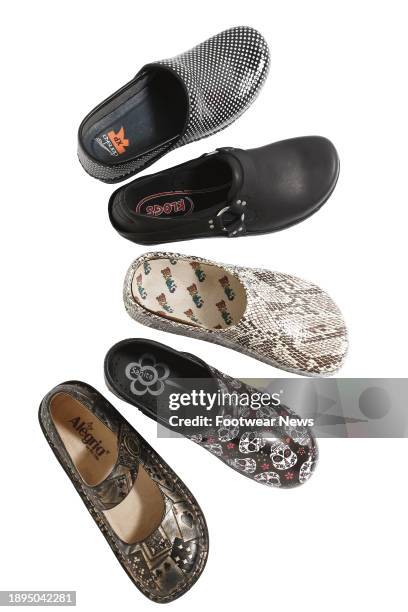 S black-and-white, closed-back styleA biker-chic clog with hardware from s lightweight reptile-print lookPatterned, open-back clog from s Mary Jane...