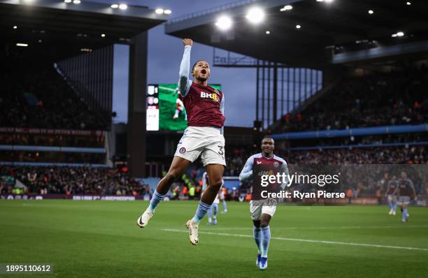 Leon Bailey of Aston Villa celebrates after scoring their team's first goal during the Premier League match between Aston Villa and Burnley FC at...