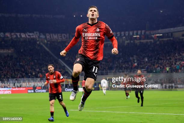 Christian Pulisic of AC Milan celebrates after scoring the opening goal during the Serie A TIM match between AC Milan and US Sassuolo at Stadio...