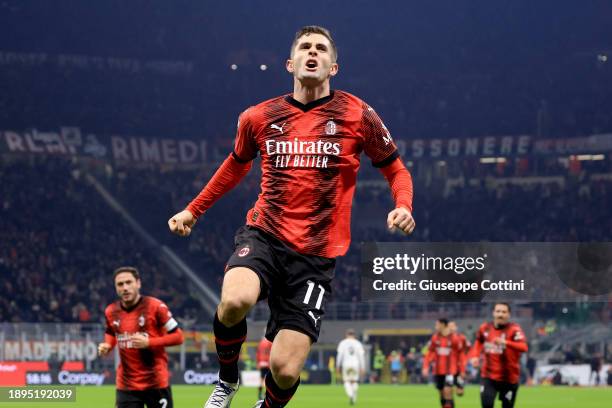 Christian Pulisic of AC Milan celebrates after scoring the opening goal during the Serie A TIM match between AC Milan and US Sassuolo at Stadio...