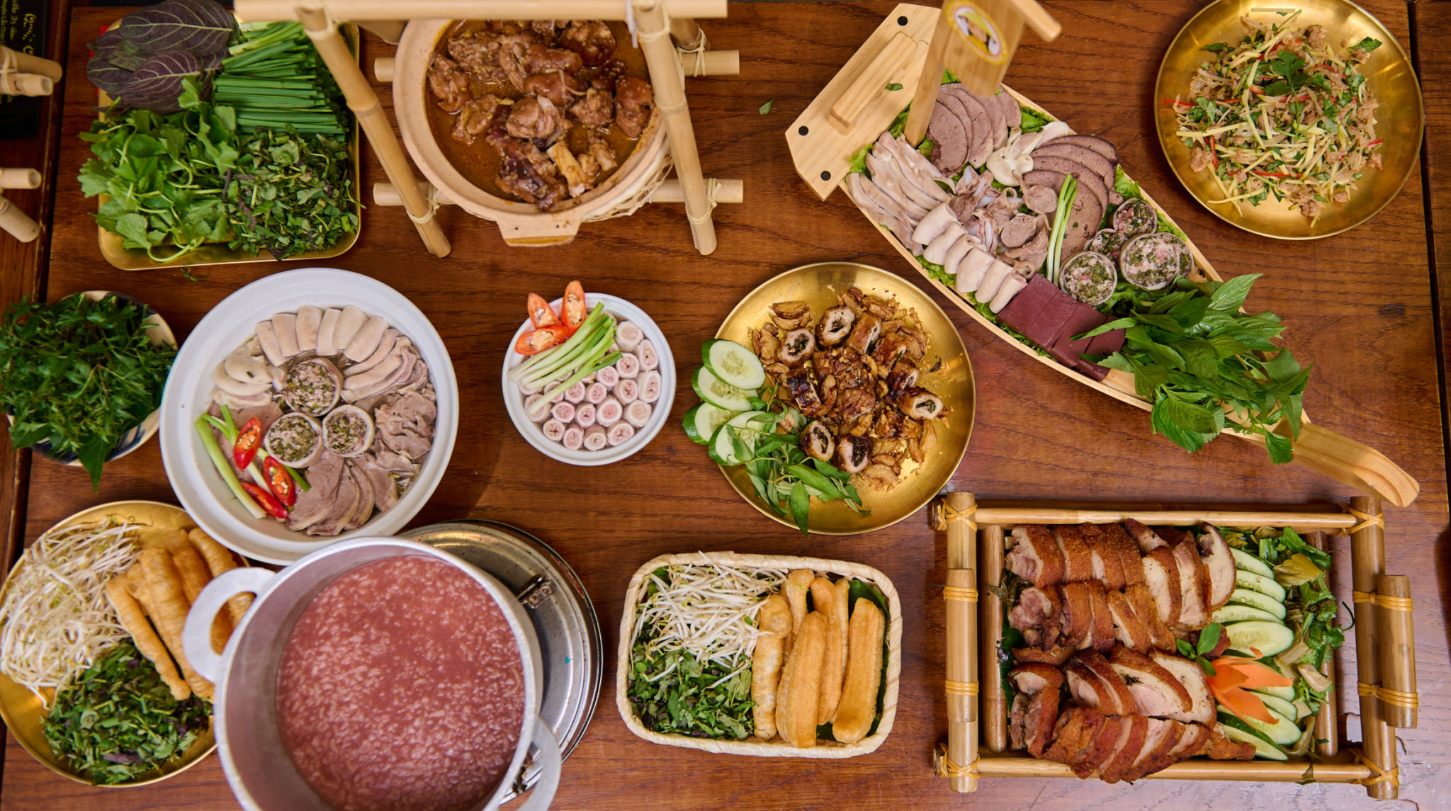 All vietnamese food in wooden table All vietnamese food in wooden table