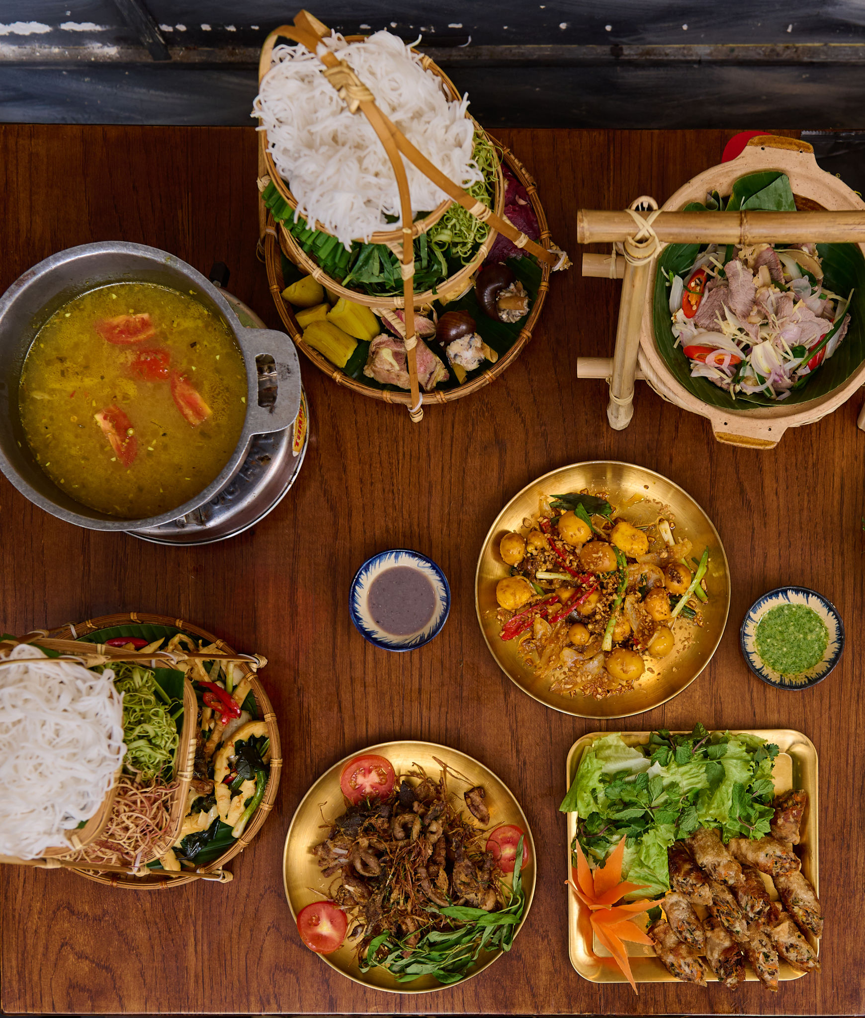Vietnamese food in wooden table Vietnamese food in wooden table