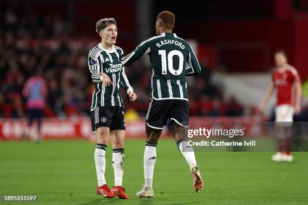 Marcus Rashford of Manchester United celebrates with team mate Alejandro Garnacho after scoring their sides first goal during the Premier League...