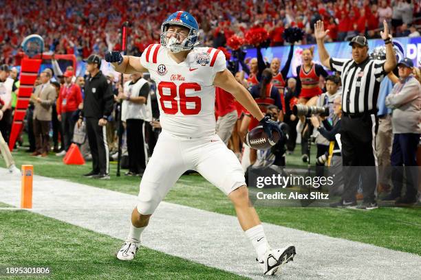 Caden Prieskorn of the Mississippi Rebels celebrates his touchdown against the Penn State Nittany Lions during the first quarter in the Chick-fil-A...