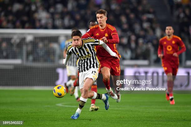 Kenan Yildiz of Juventus is challenged by Diego Llorente of AS Roma during the Serie A TIM match between Juventus and AS Roma at on December 30, 2023...